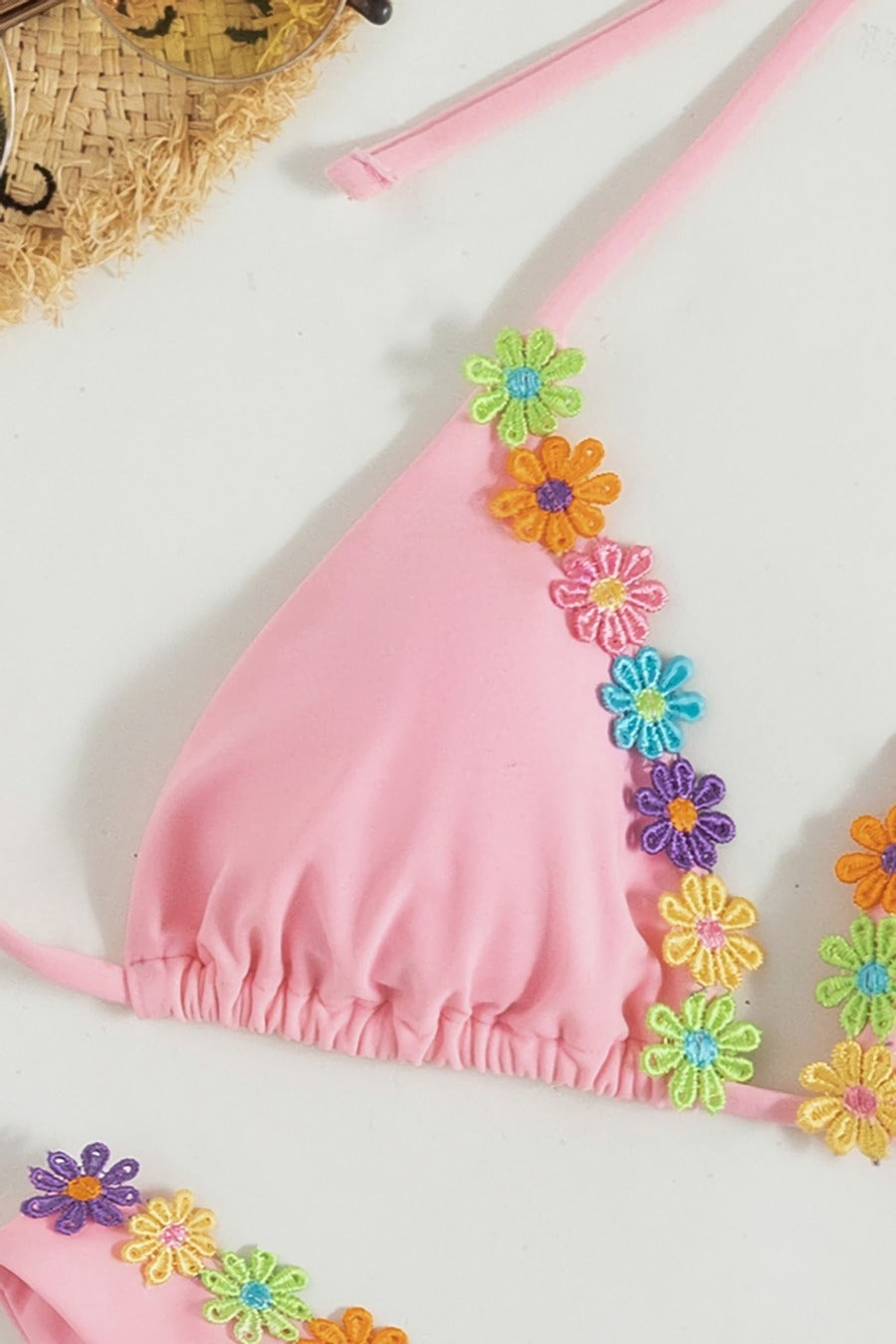 Pink Halter Style Bikini Adorned With Flowers