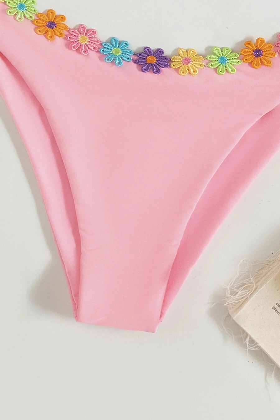 Pink Halter Style Bikini Adorned With Flowers