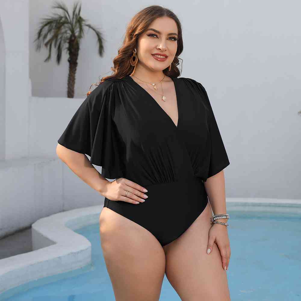 Black Plus Size Ruched Surplice Neck One-Piece Swimsuit